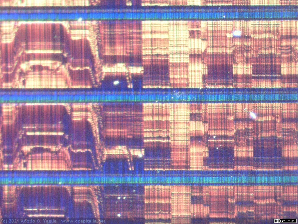 1490 - Microfotografía de nanosurcos capacitivos de un videodisco CED (3), 1981